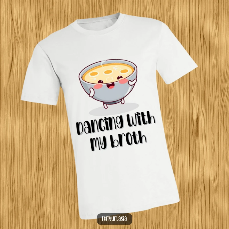 Funny T-Shirt showcases a kawaii bowl of steaming soup enthusiastically doing a little dance, spreading warmth and happiness.